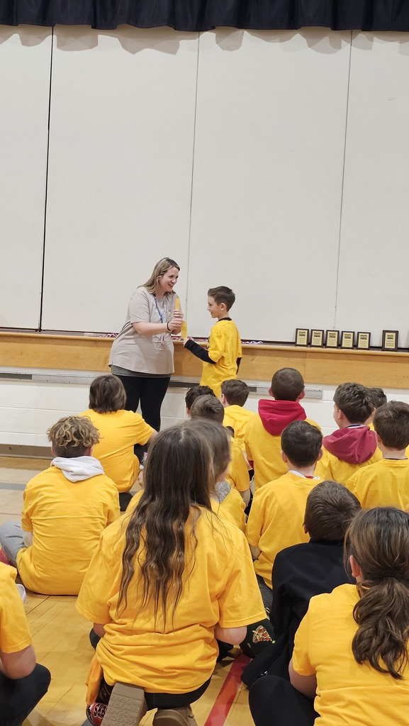 Ollie getting his award.