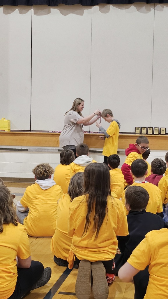 Calvin getting his medal.