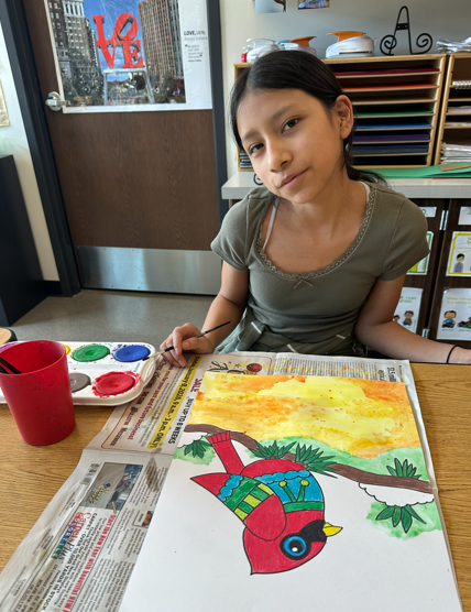 Student working on her cardinal.