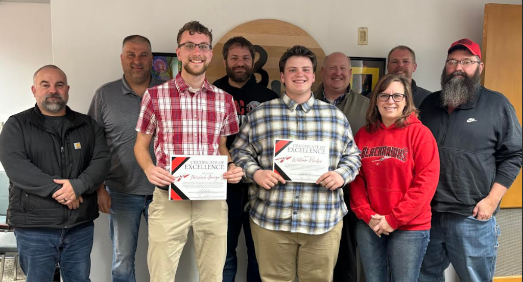 Michiah and William with the school board