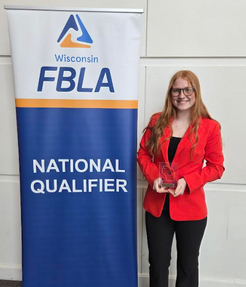 Student with her trophy.
