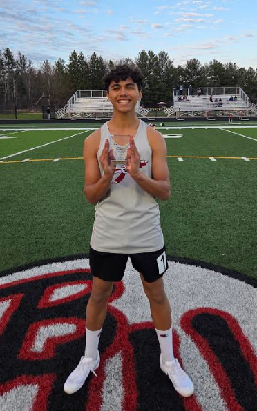 A student with his trophy.