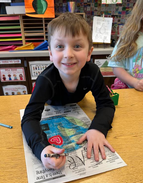 Happy student coloring.