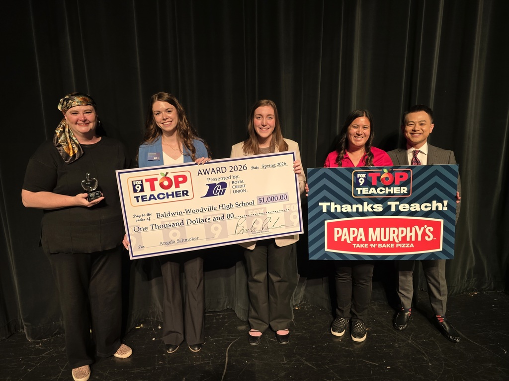 Mrs. Schmoker receiving her award.