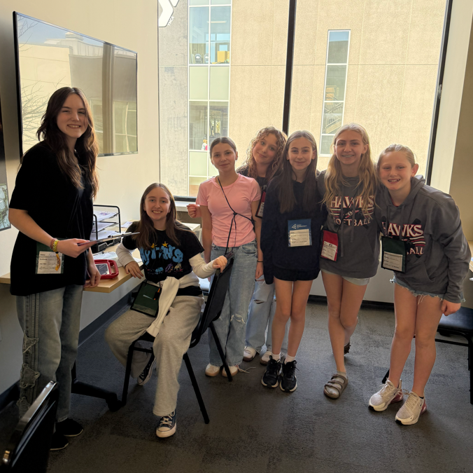 A group of smiling students.