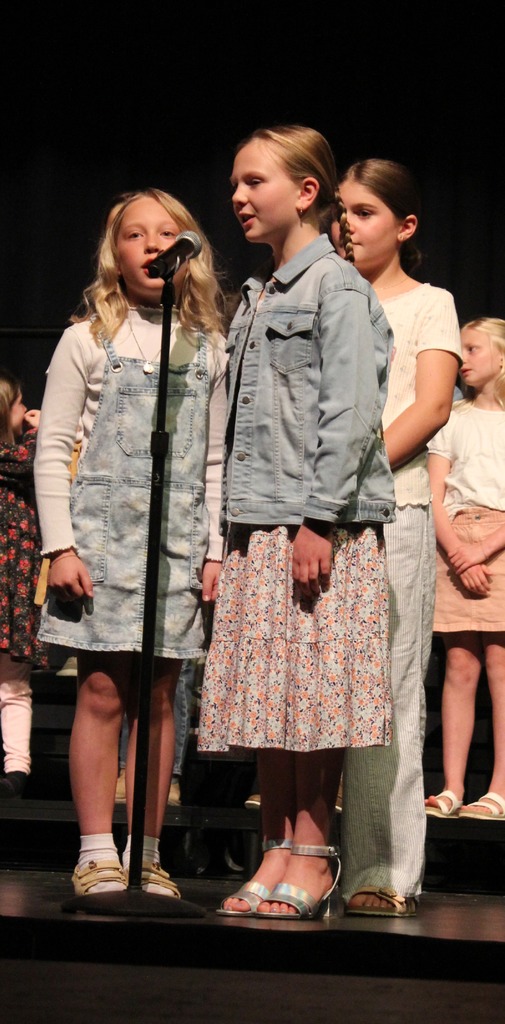 Two students singing.