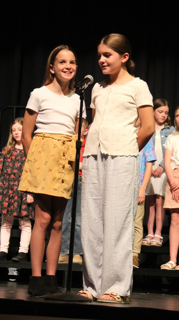 Two students singing.