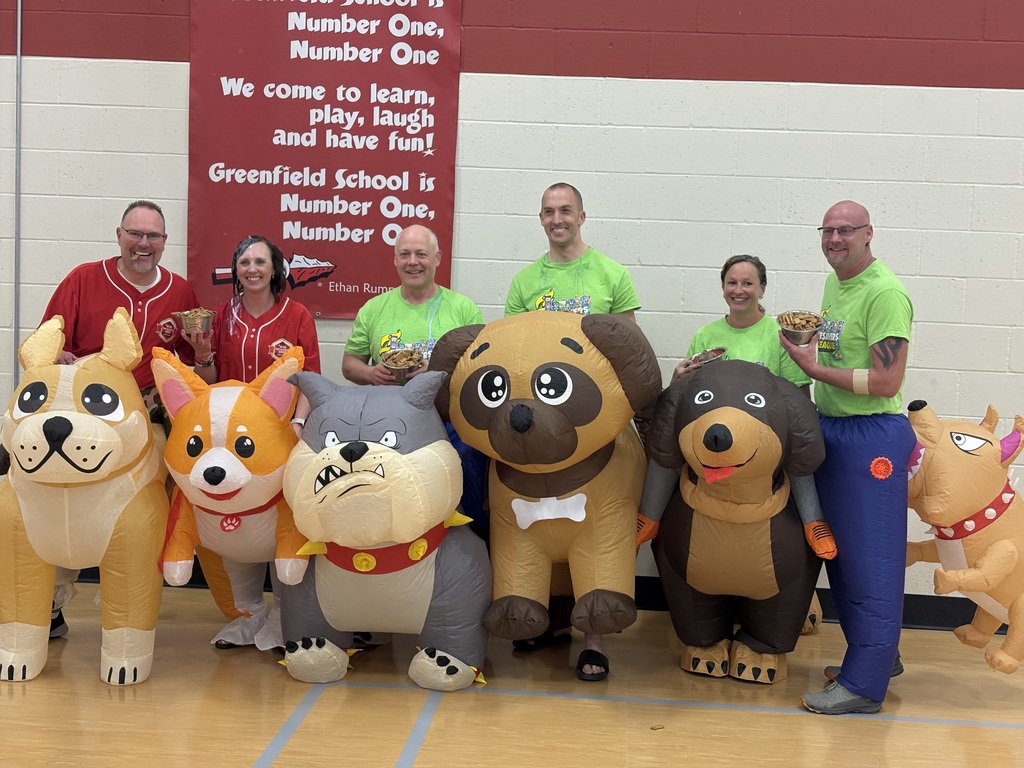 Staff in inflatable dog costumes.