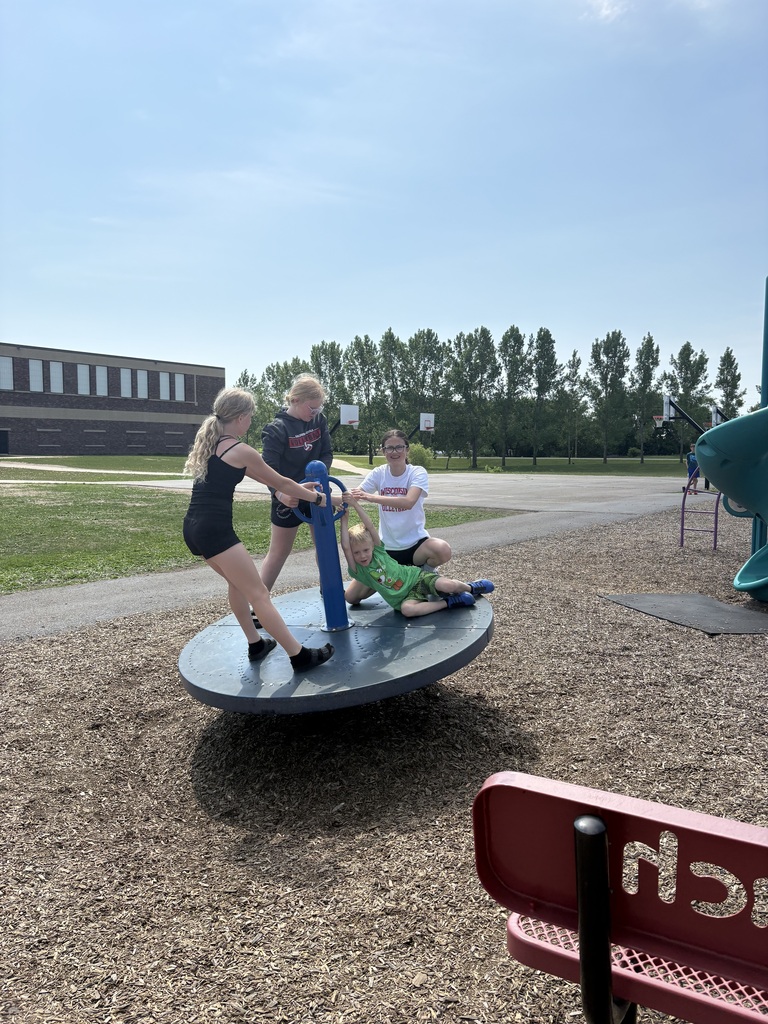 Students smiling and playing.