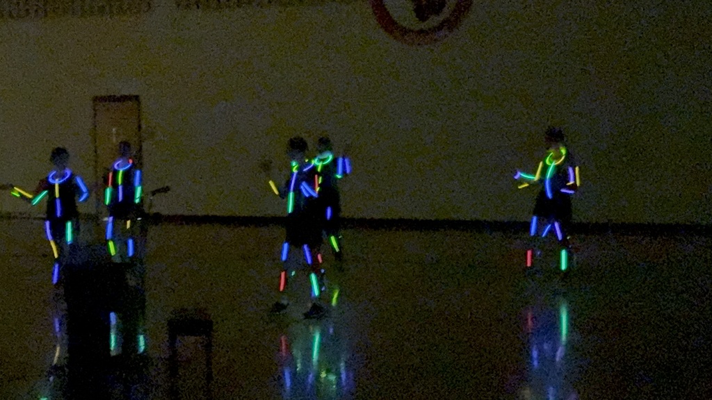 Talent Show- Students with glow in the dark necklaces