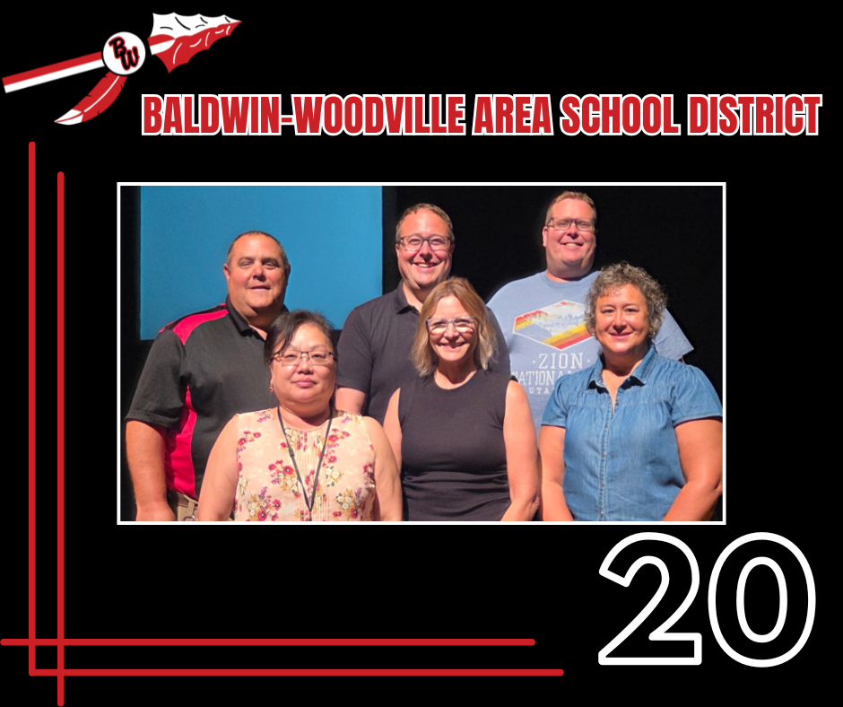 Six Baldwin-Woodville Area School District staff members pose together for a 20-year milestone recognition photo.