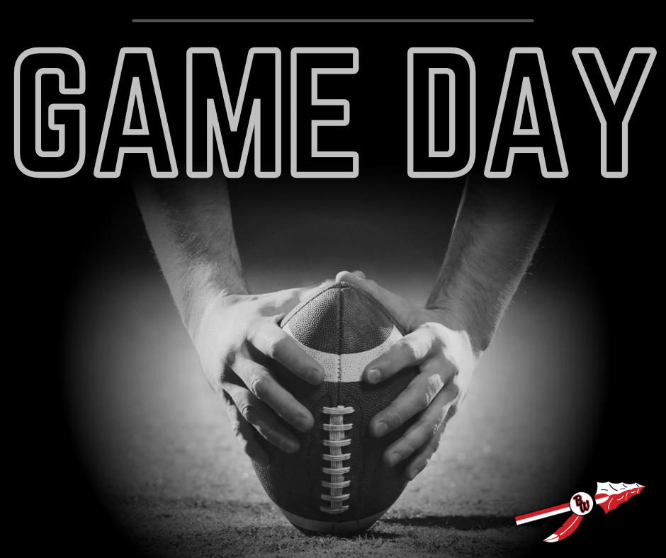 Black and white photo of hands holding a football with the words GAME DAY on a black background.