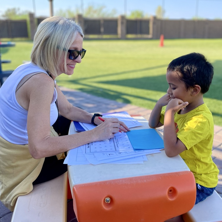 child and teacher