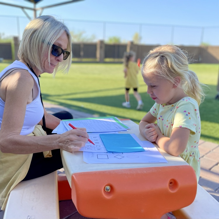child and teacher