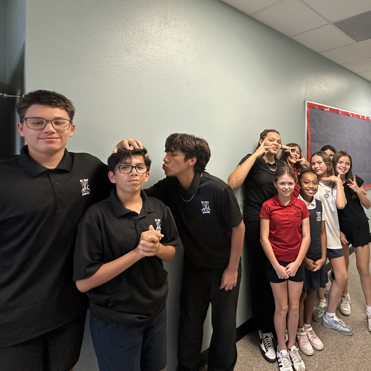 middle schoolers posing for a picture
