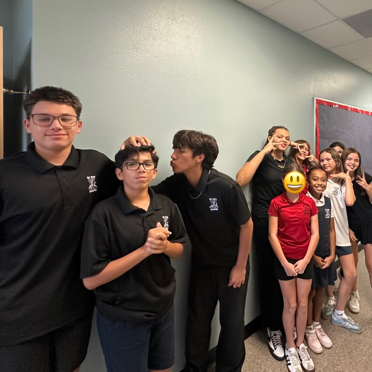 middle schoolers posing for a picture