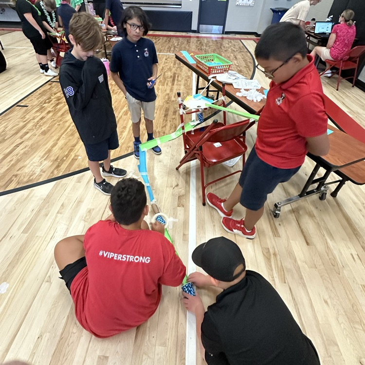 group working on marble run