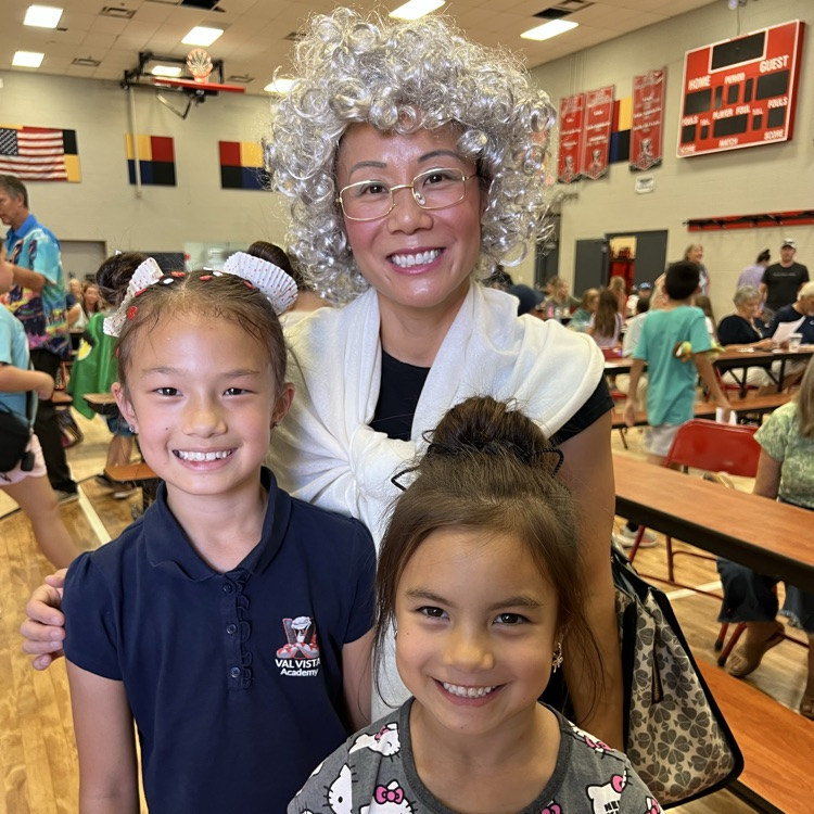 lady dressed up like a grandma with kids