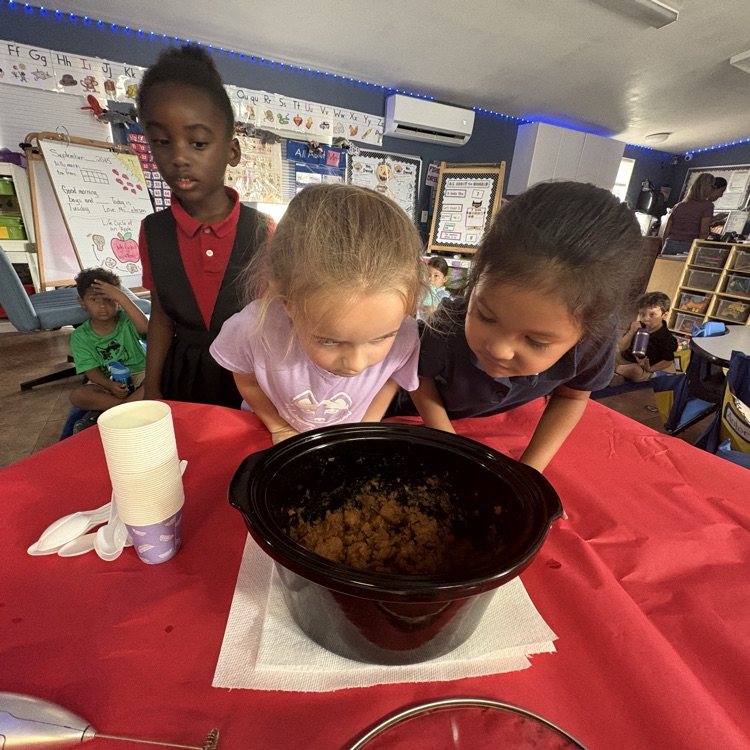 kids with apple sauce