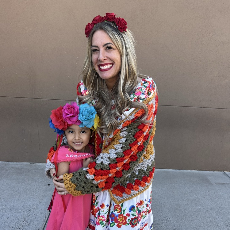 teacher hugging child