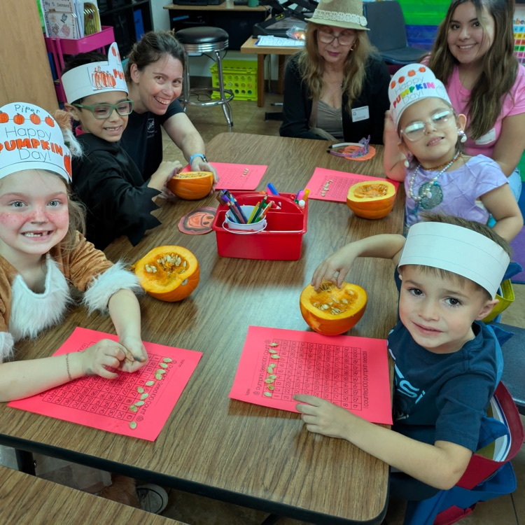 kids counting pumpkin seeds