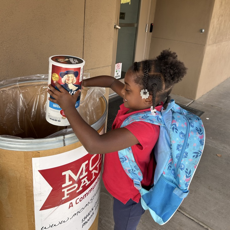 girl donating food