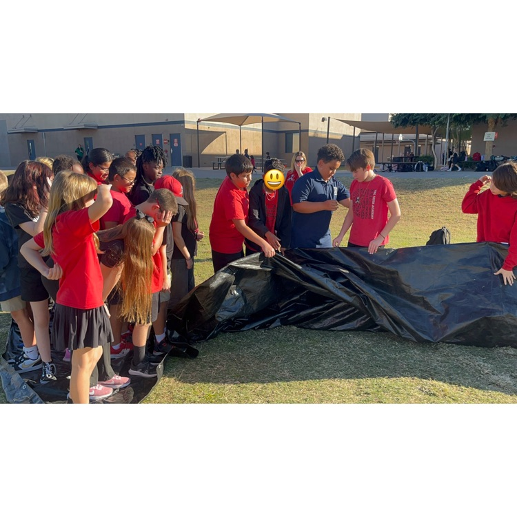 students on a tarp