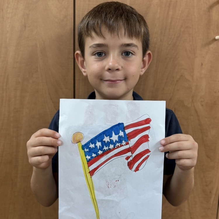 child with flag drawing