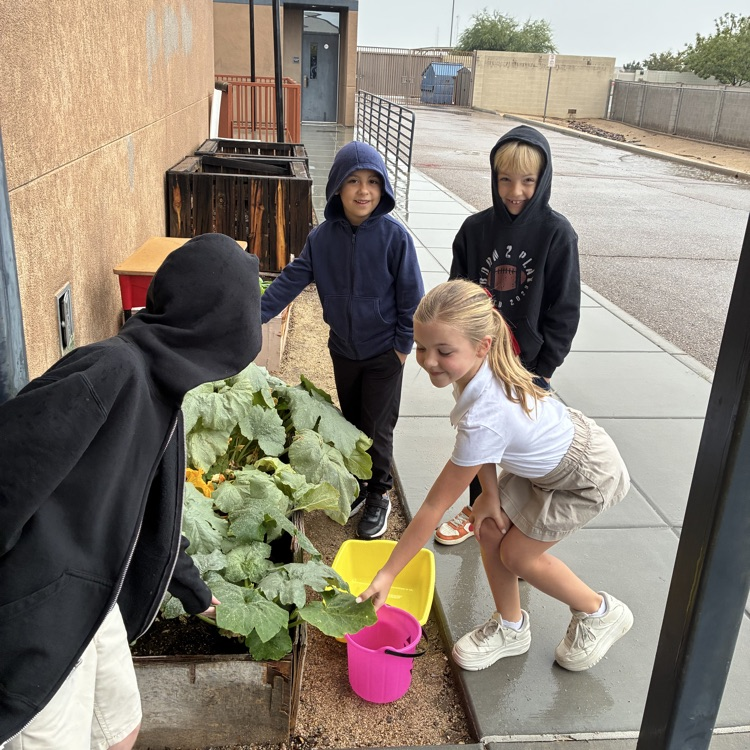 students with a bucket