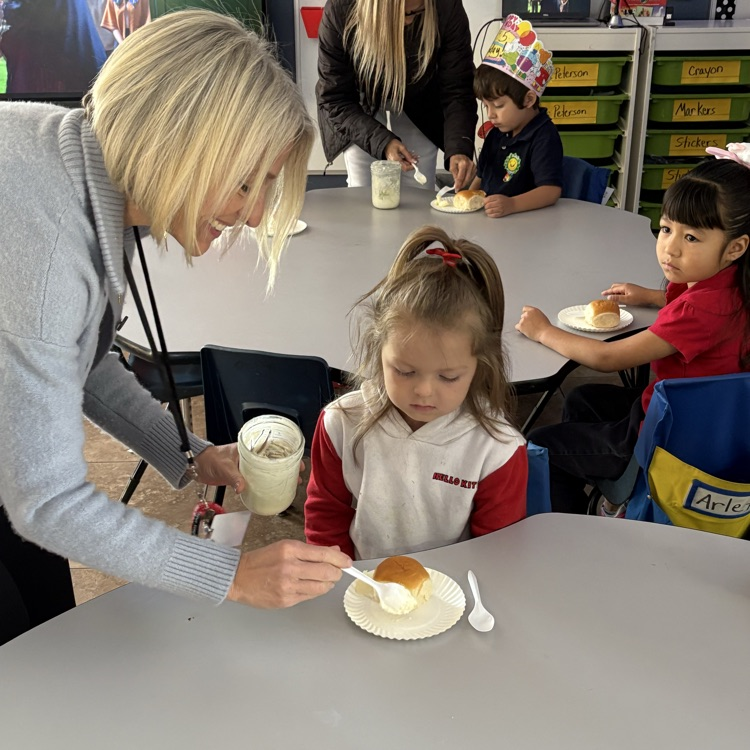 teacher helping child