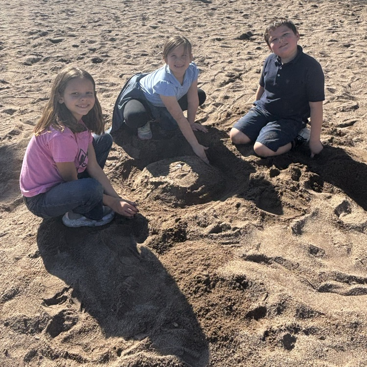 kids playing in the sand