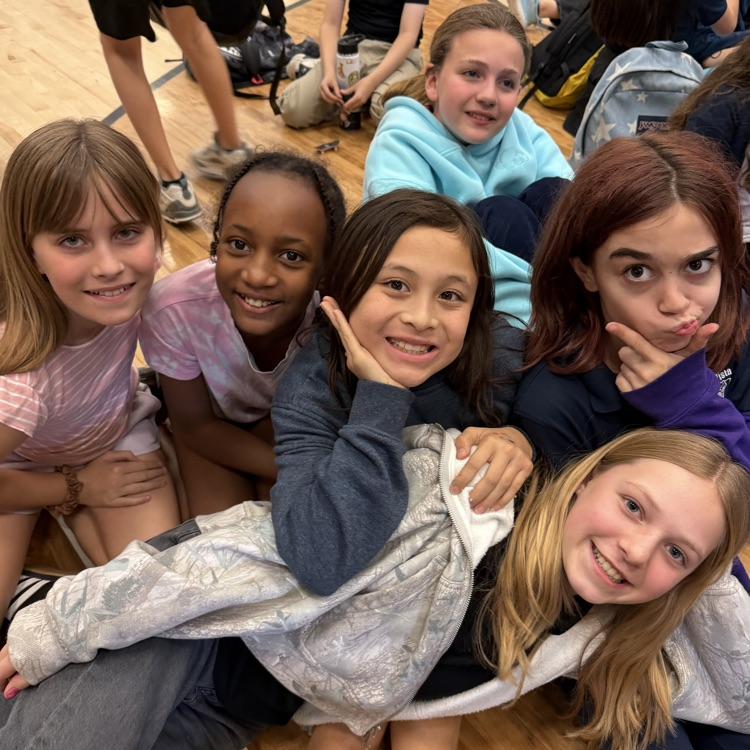 girls smiling in the gym