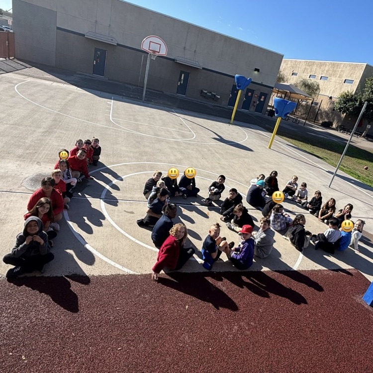 kids arranged in a 100 
