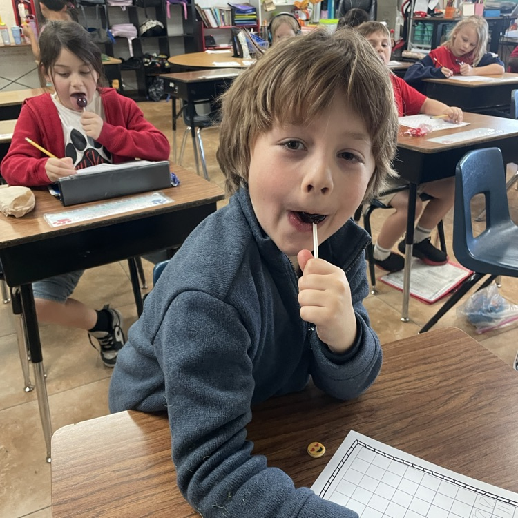 child with lollipop