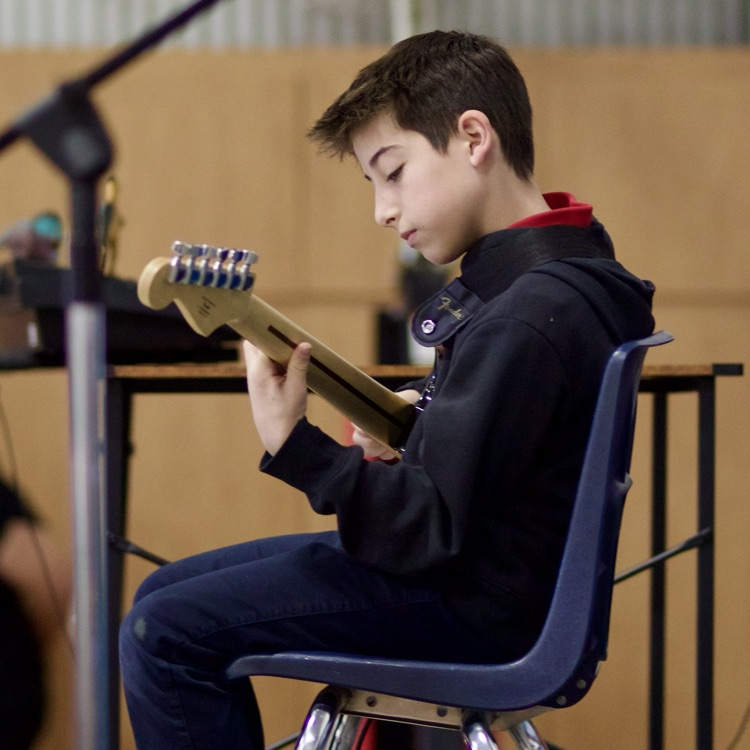 child playing guitar