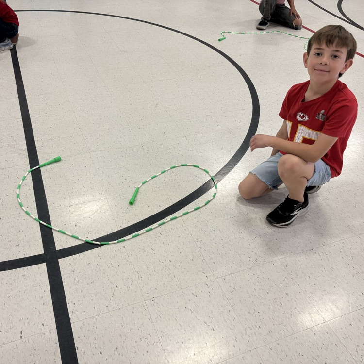 child with jump rope