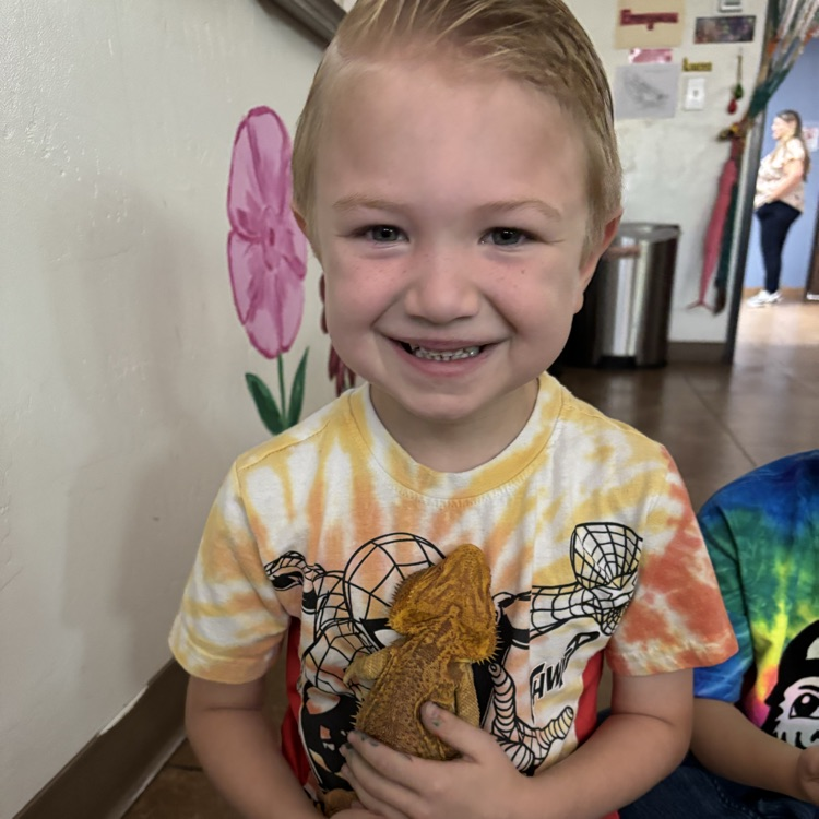 child with lizard 