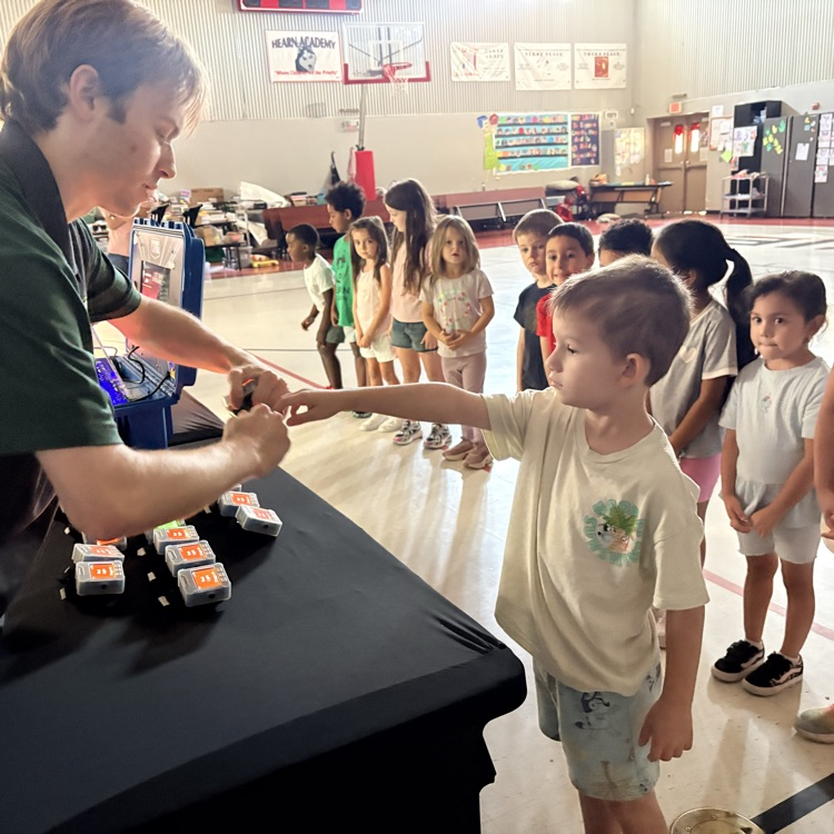 child getting bracelet