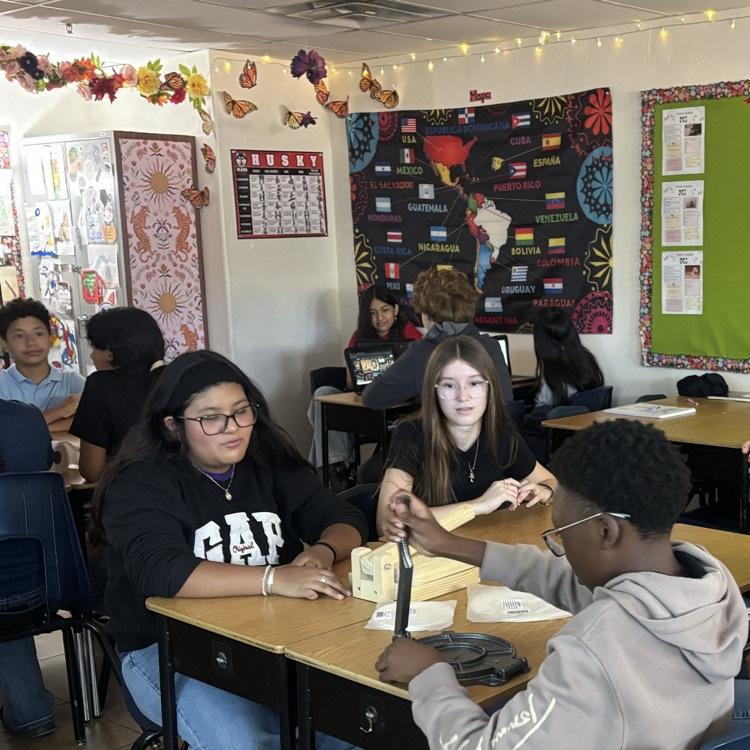 kids making tortillas
