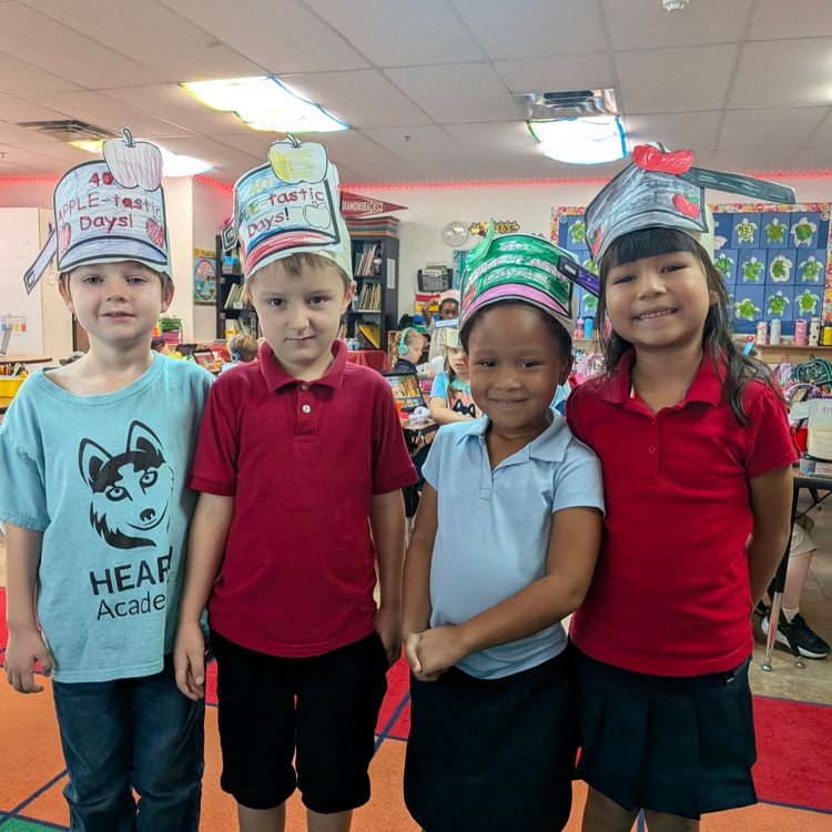 kids in apple hats 