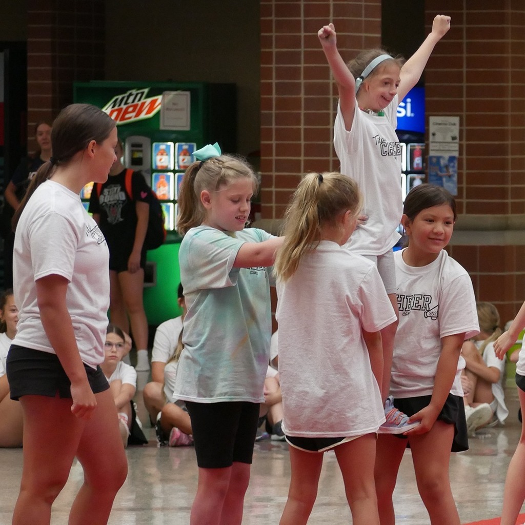 A group of girls during cheer practice