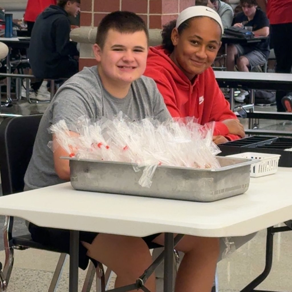 GHS students and peer helpers selling cookies on Cookie Wednesday.