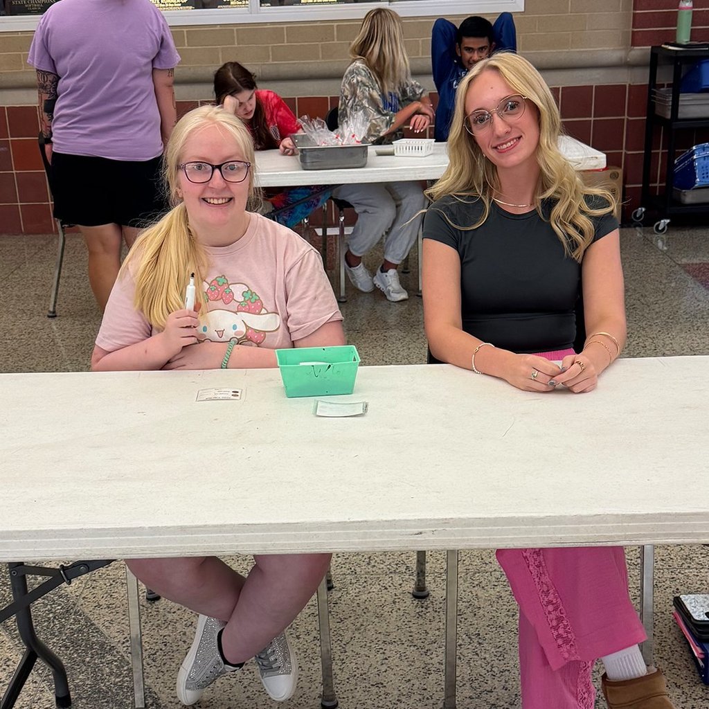 GHS students and peer helpers selling cookies on Cookie Wednesday.