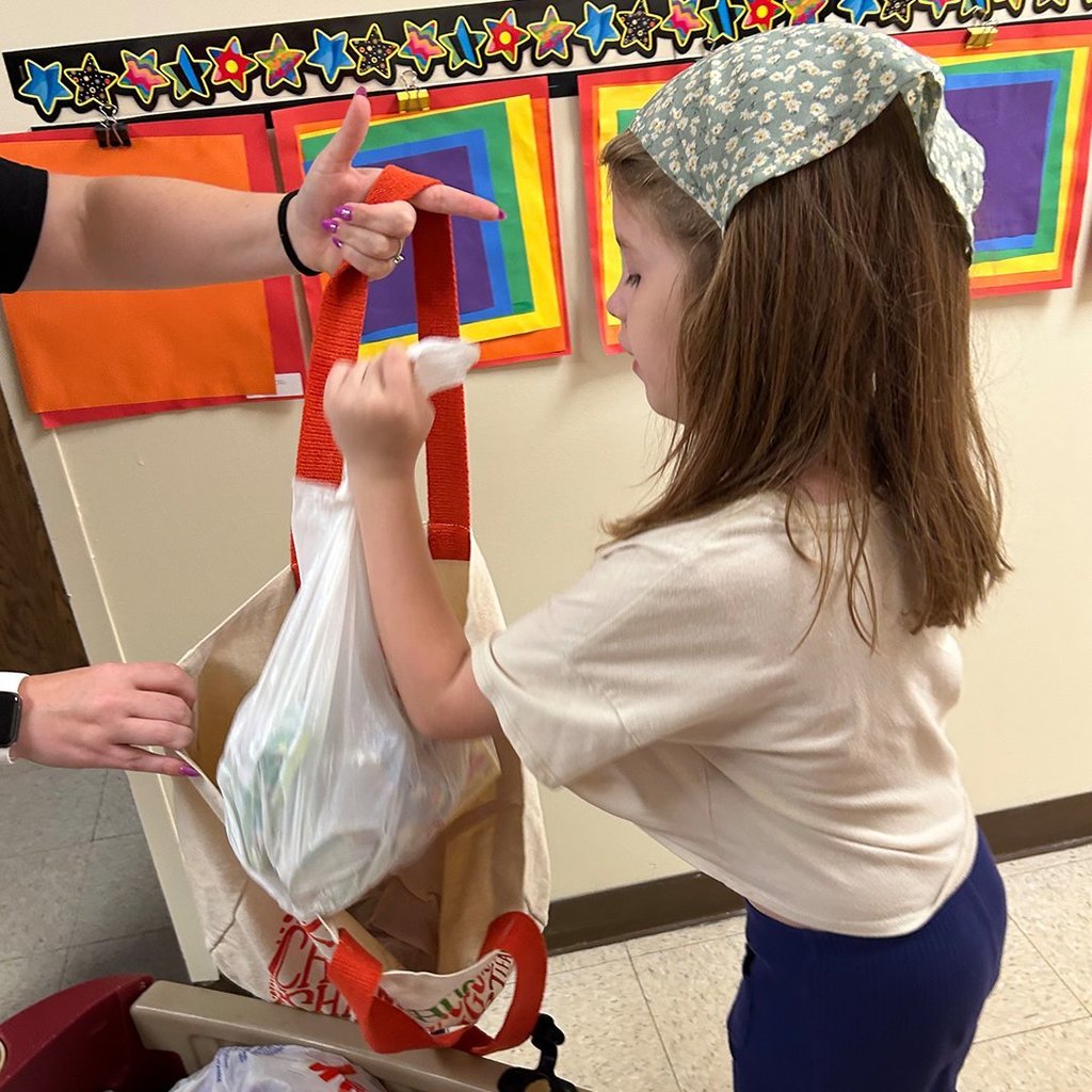 CES students delivering Titan Fuel bags.