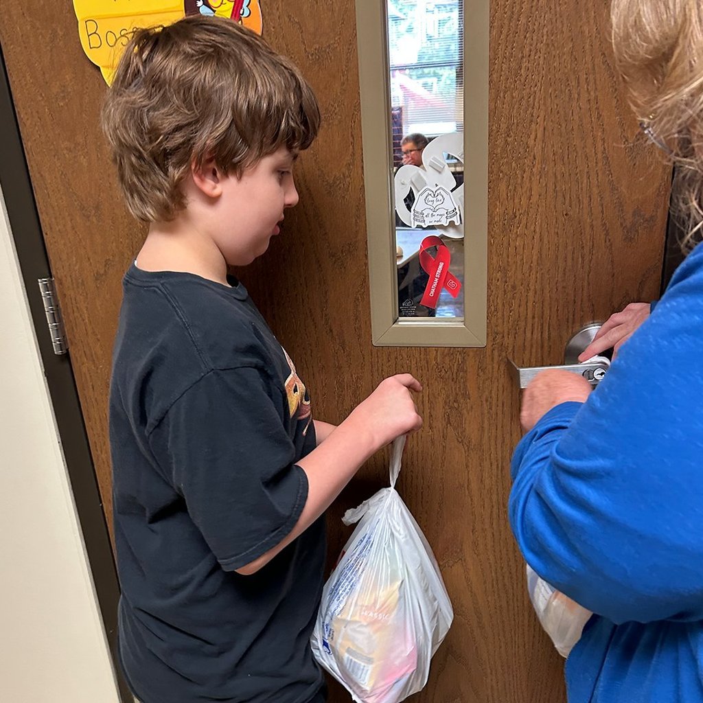 CES students delivering Titan Fuel bags.