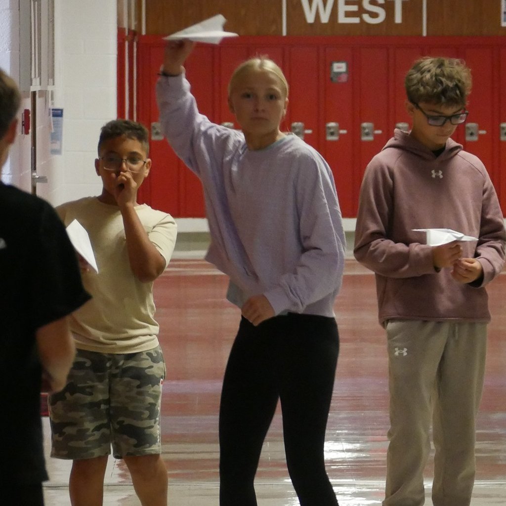 GMS students during a STEAM paper airplane contest
