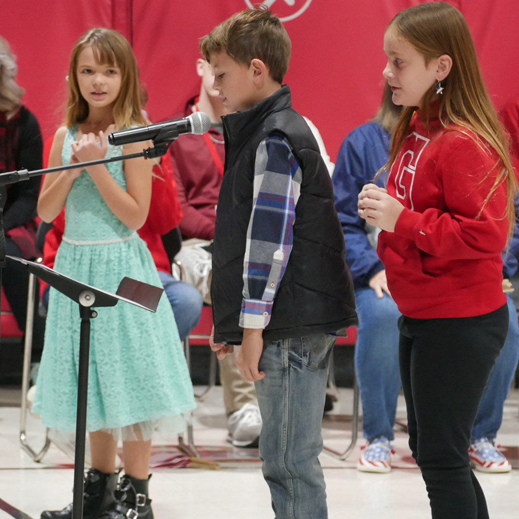 CES students performing in the Veterans Day Assembly.