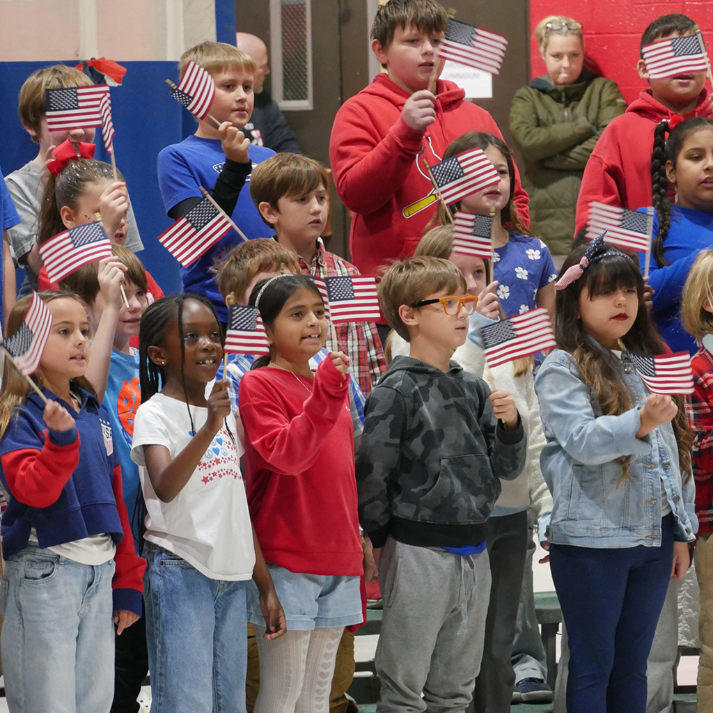 CES students performing in the Veterans Day Assembly.