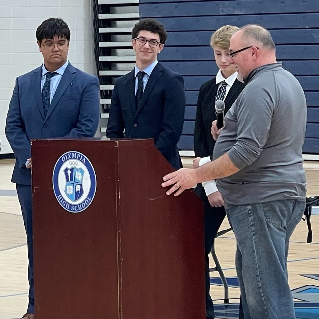 Debate Team members at Olympia