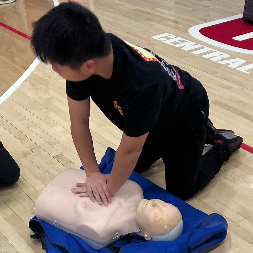 GHS health class students practicing First Aid